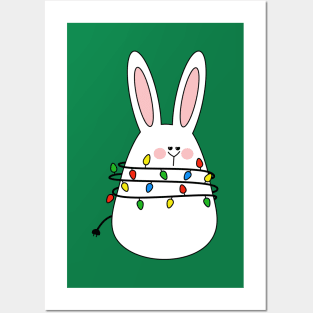 Bunny tangled in a string of Christmas lights Posters and Art